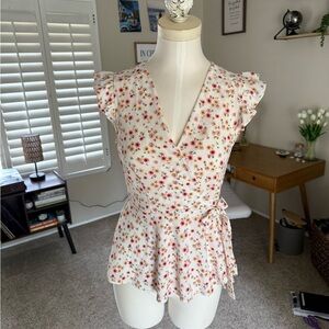 Cap sleeve V neck blouse floral print tie at waist
Perfect for spring or Easter.